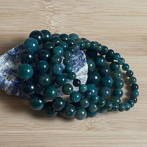 Beautiful 8-12mm Moss Agate Bead Bracelet, known for grounding and growth. Ideal for daily wear and promoting balance and harmony.Nice Gift