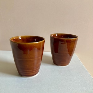 Pair of wheel thrown ceramic tumblers