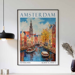 May include: A vintage travel poster featuring a colourful illustration of Amsterdam, Netherlands. The poster depicts a canal with boats, traditional buildings, and a blue sky with white clouds. The text "AMSTERDAM" is in a bold, blue font at the top of the poster. The text "NETHERLANDS" and "52.3670&deg; N, 4.8941&deg; E" are at the bottom of the poster.