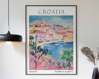 May include: A framed art print titled "CROATIA" depicts a colorful coastal town scene. The artwork features buildings with red roofs, a blue sea with sailboats, and palm trees. The print includes the text "BALKANS" and coordinates 45.1000° N, 15.2000° E.