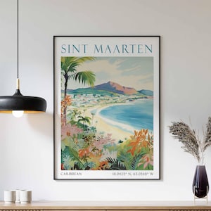 May include: Vintage travel poster for Sint Maarten, a Caribbean island. The poster features a colorful illustration of a beach with palm trees and a mountain in the background. The text "SINT MAARTEN" is in a blue font at the top of the poster, and the text "CARIBBEAN 18.0425° N, 63.0548° W" is at the bottom.