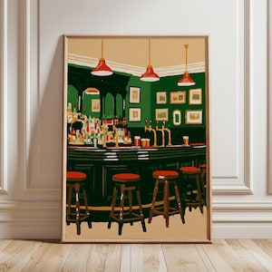 May include: A framed art print depicting a pub interior with a dark green bar, four wooden stools with red seats, and three red pendant lights hanging from a beige ceiling. The back bar features shelves of bottles, beer taps, and framed wall art.