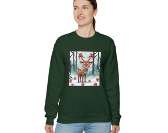 May include: A dark green sweatshirt with a cartoon reindeer wearing a scarf and antlers in a snowy forest scene. The reindeer is surrounded by red and white candy canes.