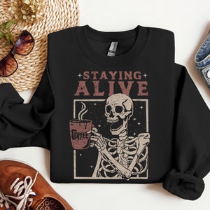 Staying Alive Sweatshirt For Halloween, Halloween Skeleton Hoodie, Funny Skeleton Sweatshirt, Gift For Coffee Lovers, Trendy Coffee Hoodie
