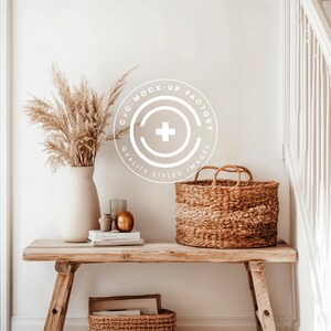May include: A white wooden bench with a woven basket, a vase with dried pampas grass, and a stack of books. The wall behind the bench has a white circle logo with the text "C+C MOCK-UP FACTORY QUALITY STYLED IMAGES".