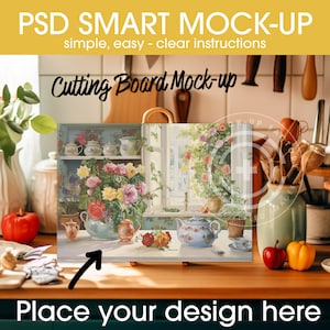 May include: A mock-up of a cutting board with a floral painting on it. The board is sitting on a wooden table with a green vase, apples, and a pumpkin in the background. The text "Place your design here" is written below the board.