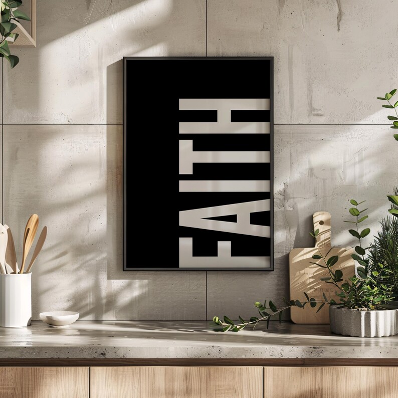 May include: A black and white poster with the word "FAITH" printed in white letters on a black background.