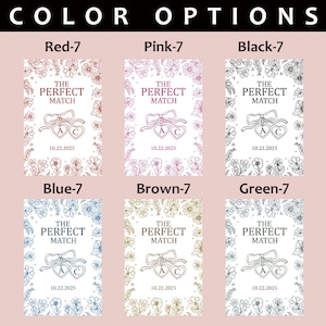 May include: A selection of wedding favor cards with floral borders and the text "THE PERFECT MATCH." Each card features a bow, two hearts with the letters "A" and "C," and the date "10.22.2025." Color options include red, pink, black, blue, brown, and green.