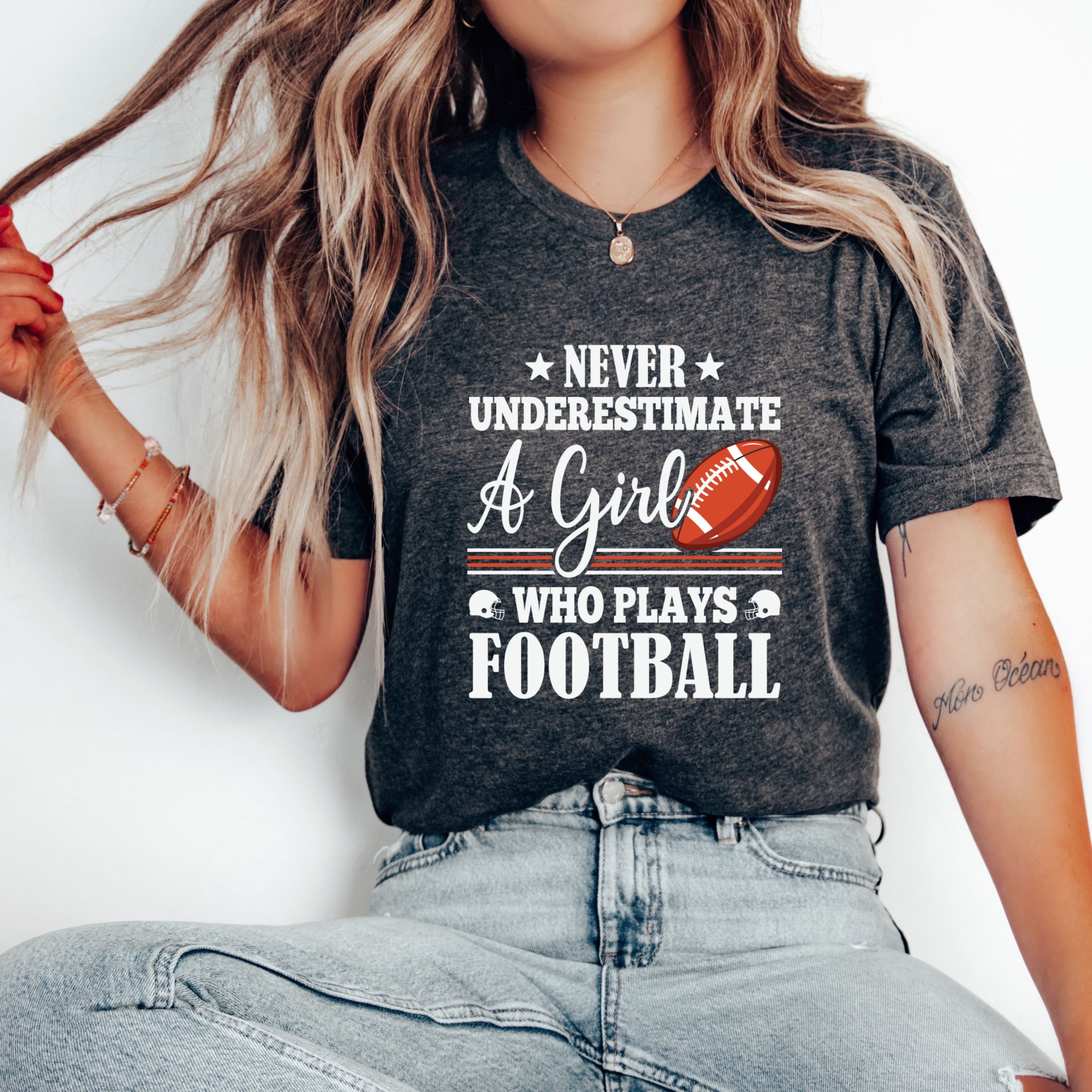 Never Underestimate A Girl Who Plays Football T-Shirt Women Never Underestimate A Girl Who Plays Football T-Shirt Women