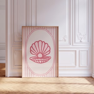 May include: A pink and white striped poster with a pink seashell and pearl inside a pink oval frame.