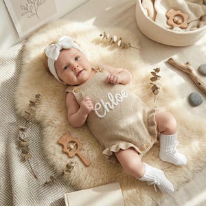 May include: A handmade wooden sign with the text "Welcome" in a playful font. The sign features a distressed white background and a dark stained wooden frame, perfect for a front door or entryway.