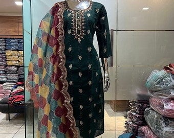 May include: A dark green dress with gold embroidery and a matching patterned dupatta. The dupatta has a maroon border with gold accents.