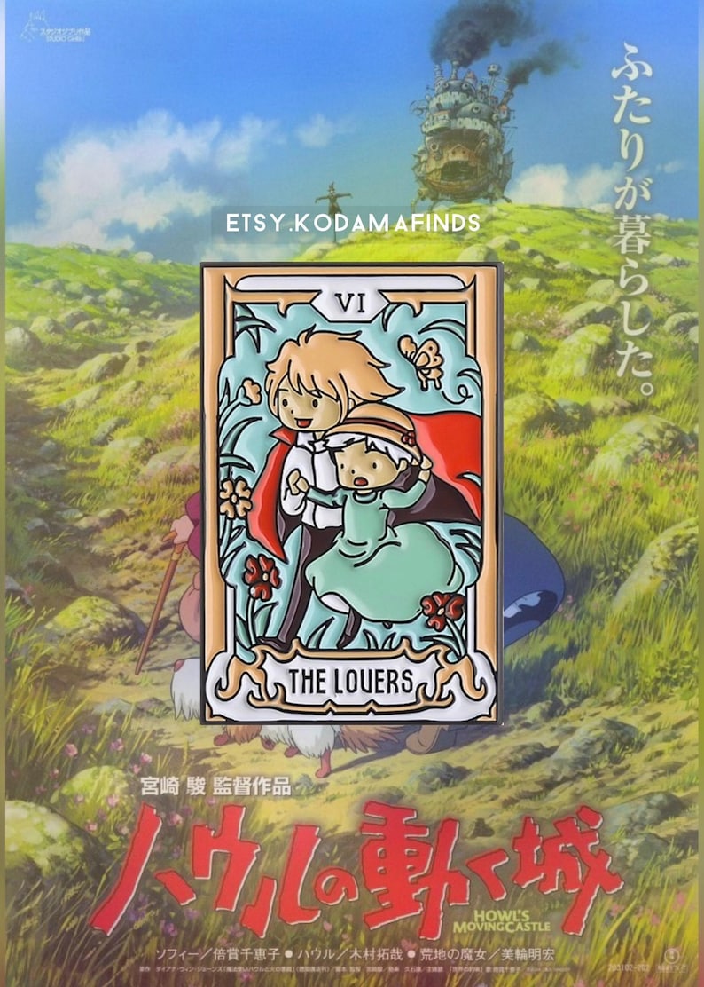 May include: A white enamel pin with a cartoon image of two characters from the movie Howl's Moving Castle. The pin is a tarot card design with the number VI and the words "The Lovers" at the bottom. The pin is surrounded by a white border.