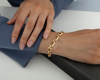 14 kt geelgouden rechthoekige schakelarmband met pavé-accenten