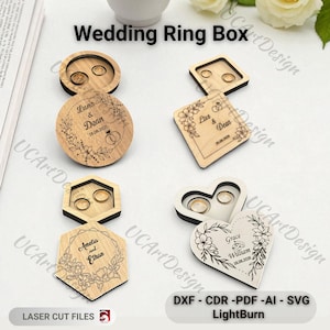 May include: A selection of wooden wedding ring boxes in different shapes, including round, square, hexagonal, and heart-shaped designs. Each box is engraved with names and a wedding date, and designed to hold two rings. Laser cut from light wood.