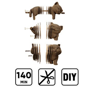 May include: A brown cardboard cat sculpture kit featuring layered segments that assemble into a feline figure. The set includes metal fasteners and instructions for assembly. Below are three icons: 140 MIN, a no-scissors symbol, and DIY.