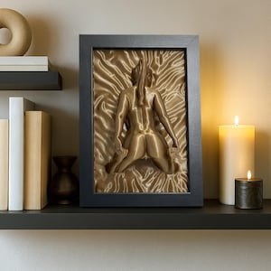 Bronze naked woman erotic art sculpture displayed with candles