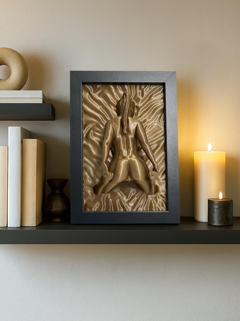 Bronze naked woman erotic art sculpture displayed with candles