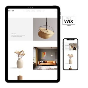 May include: A tablet and smartphone display a website showcasing home decor. The website features a pendant light, a vase with dried flowers, and a leather sofa. The text "Built on Wix Studio" is also visible.