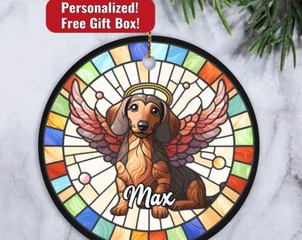 May include: A stained glass style Christmas ornament featuring a dachshund with angel wings. The dog is brown and black with a halo above its head. The ornament is surrounded by a colorful stained glass pattern and the name "Max" is written below the dog.