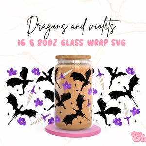 May include: A glass jar with a brown lid and a brown liquid inside. The jar is surrounded by a pattern of black dragons and purple flowers. The text "Dragons and Violets 16 & 20oz Glass Wrap SVG" is at the top of the image.