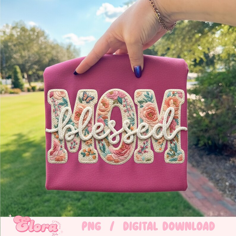 May include: A magenta-colored t-shirt with the word "MOM" in floral embroidery and the word "Blessed" in a cream-colored script. A butterfly is embroidered on the letter "O". The shirt is a digital download.