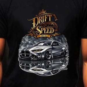 May include: A black t-shirt featuring a graphic of a silver sports car with yellow headlights and a wide-body kit. Above the car is a gold ornate emblem with the text "DRIFT SPEED SINCE 1991". The car is surrounded by dark smoke and has a reflection.