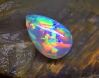 AAA ++ Qualität Natürlicher äthiopischer Opal 15.2x9.8x6.6 MM Größe Birnenform Opal Cabochon Lose Opal Edelsteine Tanzen Feueropal Pinkish Feueropal