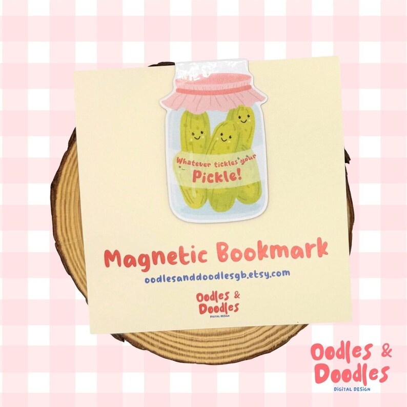 a magnetic bookmark with a playful design of a jar of pickles and a caption that reads "Whatever tickles your Pickle!"