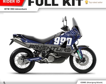 May include: A blue, gray, and white motorcycle graphic kit for a KTM 990 Adventure motorcycle. The kit features the text "READY TO RACE 33" and "990 ADVENTURE".