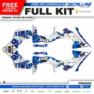 Peut inclure: Un kit complet d'autocollants graphiques de motocross bleu et blanc pour un Yamaha YFZ450, 2014-2023. Les autocollants présentent un motif de flamme bleu et blanc avec le mot "FOX" en lettres blanches sur fond bleu. Les autocollants comprennent également le numéro "108" en lettres blanches sur fond bleu.
