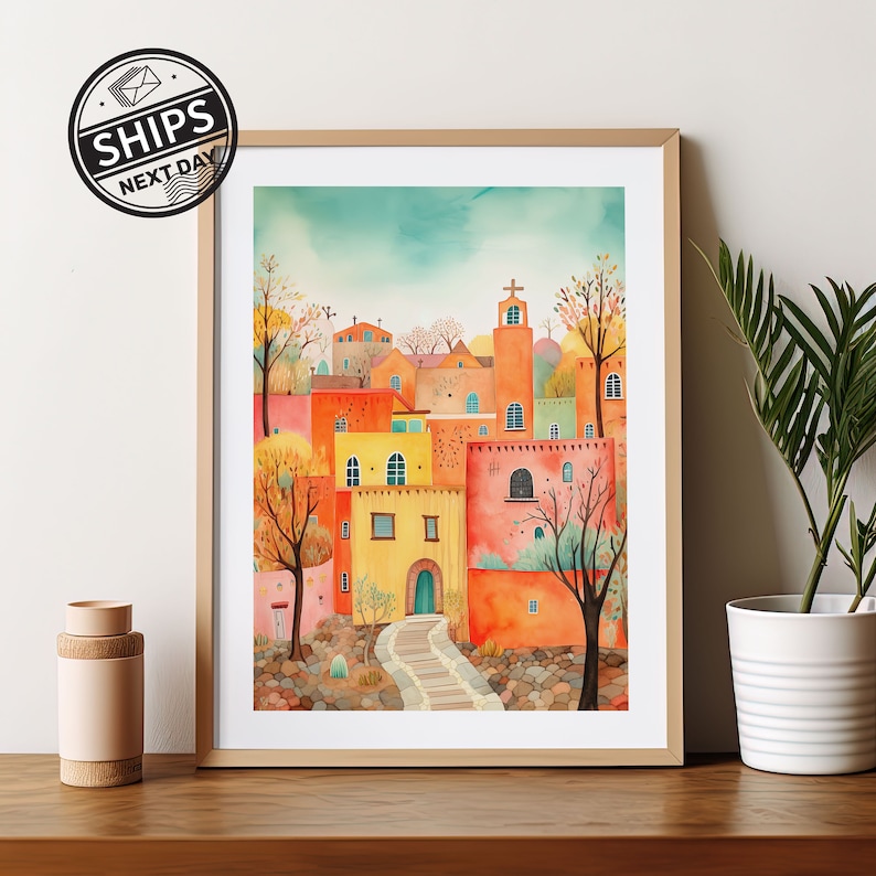 May include: Watercolor painting of a colorful village with a church steeple, surrounded by trees and a stone path leading up to the church.