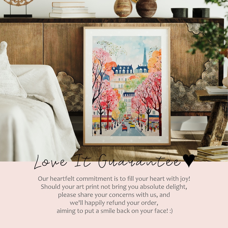 May include: Watercolor painting of a Parisian street scene with pink cherry blossom trees lining the street. The buildings are in the background and there are cars and people walking on the street. The painting is framed in a light wood frame.