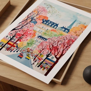 May include: A watercolor painting of a Parisian street scene with pink and white cherry blossoms, a blue building with white trim, and people walking on the sidewalk.