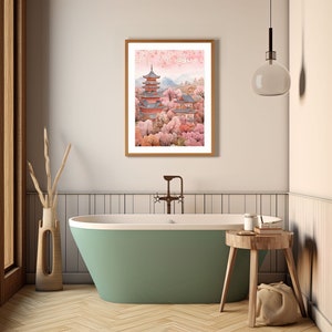 May include: A framed print of a Japanese temple surrounded by pink cherry blossom trees. The temple has a multi-tiered roof and is painted in shades of red and brown. The background features a mountain range and a sky filled with delicate pink blossoms.