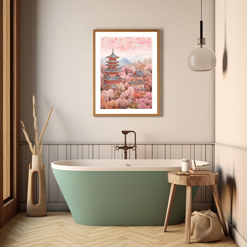 May include: A framed print of a Japanese temple surrounded by pink cherry blossom trees. The temple has a multi-tiered roof and is painted in shades of red and brown. The background features a mountain range and a sky filled with delicate pink blossoms.