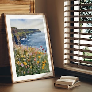 以下が含まれることがあります： アイルランドのモハーの断崖を描いた水彩画で、前景には野花が咲いています。断崖は高く、劇的で、海は深い青色です。野花は黄色、ピンク、紫など、さまざまな色をしています。
