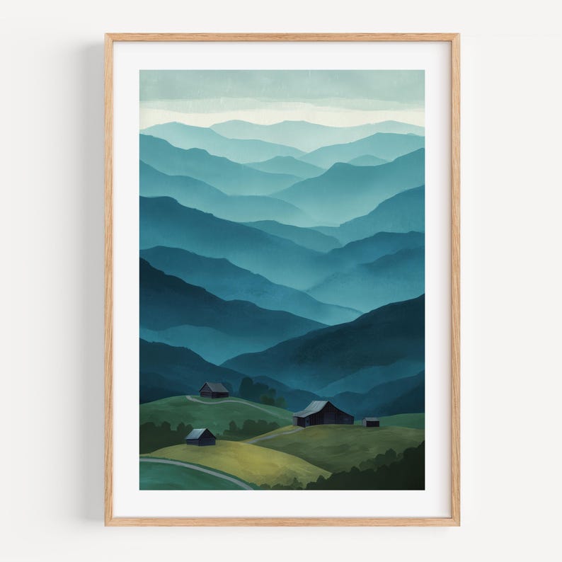 May include: A framed art print featuring a watercolor landscape of layered blue mountains. Small buildings are nestled on green hills in the foreground. The artwork has a serene, natural theme.