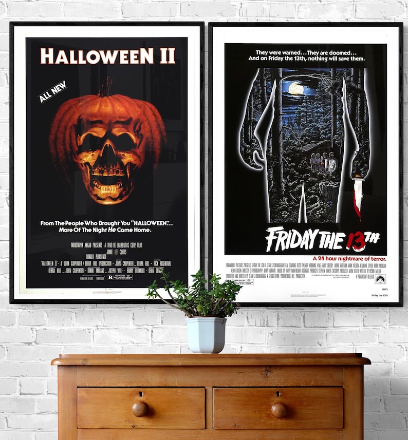 Two movie posters, side-by-side, for the horror films Halloween II and Friday the 13th. The Halloween II poster features a jack-o-lantern with a skull face. The Friday the 13th poster features a silhouette of a person holding a knife.