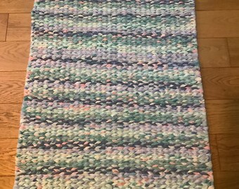 24 X 48 Twined Rag Rug in blues. Teals, coral