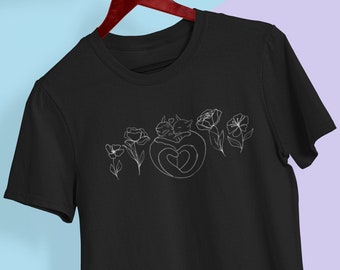Katten knuffelen met bloemen Unisex Jersey T-shirt met korte mouwen