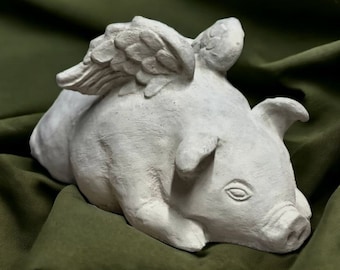 Flying pig with wings figure Concrete laying pig statue Detailed stone made sculpture