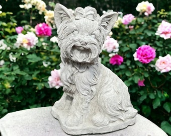 Yorkshire terrier dog with bow in hair statue Sitting Yorkie on base figure