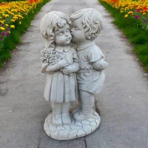 Whispering boy figure Large girl sculpture Backyard cement decoration Extra large children on base statuary Kids kissing figurine