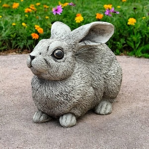 Enchanted bunny statue Wild animal art Concrete rabbit sculpture Cozy backyard decoration Stone bunny looking up
