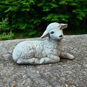 Stone laying lamb statue Concrete sheep figure Detailed lamb sculpture Farm animal figurine Outdoor decor
