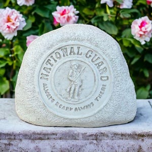 National Guard rock sculpture Concrete garden figure Massive memorial rock Fallen soldier statue