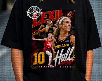 Op de afbeelding: Zwart t-shirt met een afbeelding van een basketbalspeler, de naam "LEXIE" en "INDIANA HULL". Het ontwerp bevat "INDIANA FEVER" en "100% ORIGINAL Design". Het nummer "10" is ook te zien.
