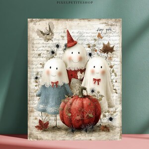 May include: A rectangular print featuring three white ghost figures with simple facial features, one wearing a red hat, positioned behind a large, textured red pumpkin. The background displays vintage-style cursive script, autumn leaves, and small spider illustrations.
