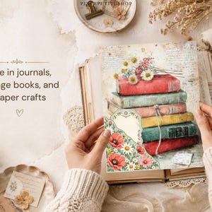 May include: A rectangular paper sheet featuring a stack of colorful vintage books in red, green, yellow, and blue, topped with white and pink flowers. A decorative tag with floral borders is attached to the side, set against a script background.
